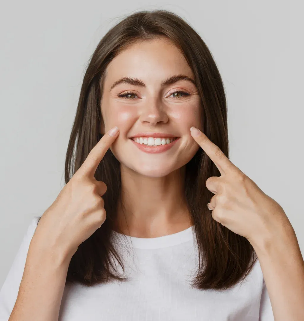 Patient smiling during a comfortable dental visit at Royale Dental