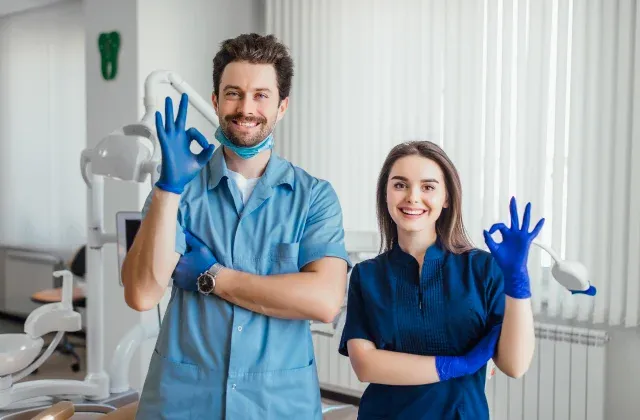 Royale Dental team welcoming patients at the front desk